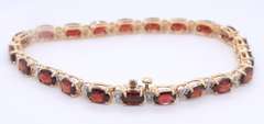 Wonderful Yellow Gold oval Garnet and Diamond Bracelet