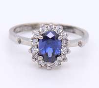 Charming White Gold Tanzanite and Diamond Halo Ring