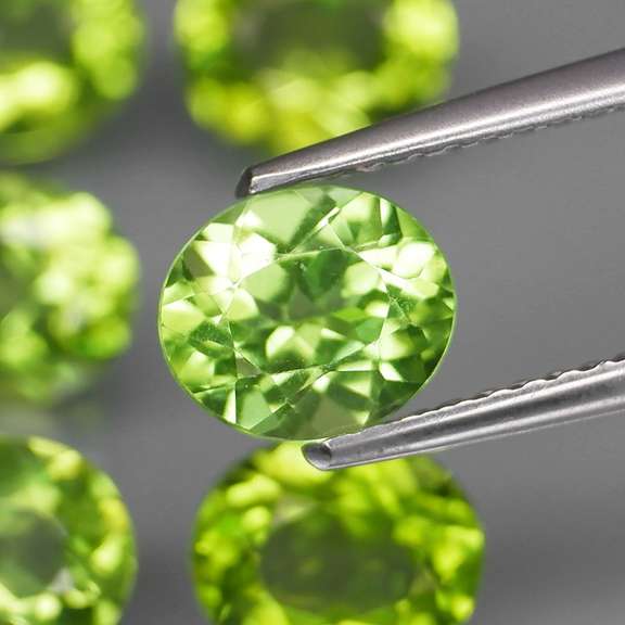 Ravishing 7.38ct untreated lime green Peridot set