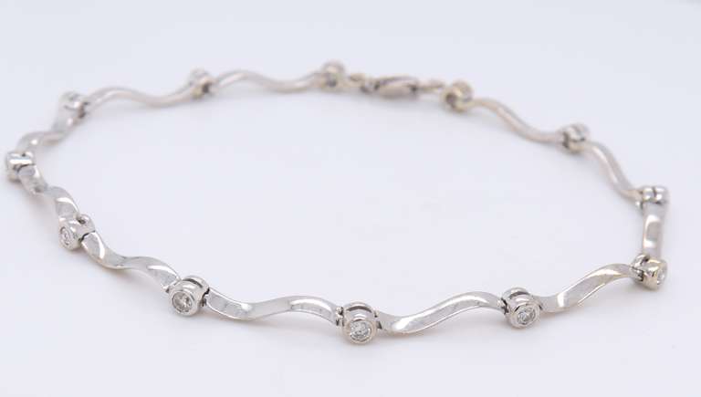 Elegant White Gold Diamond Station Wave Bracelet