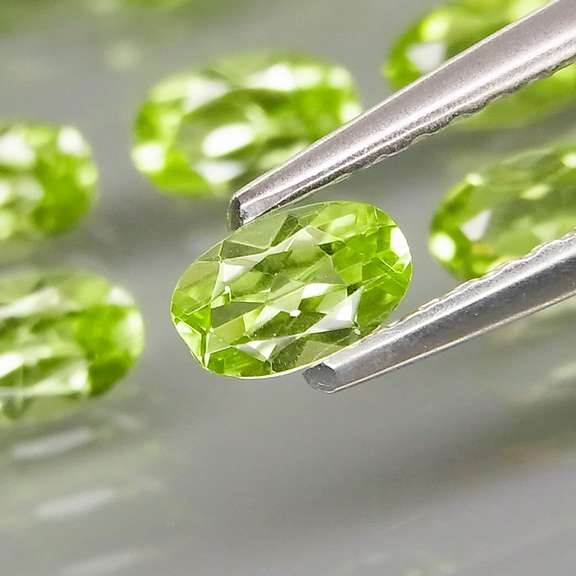 Real 8.55ct untreated apple green Peridot set