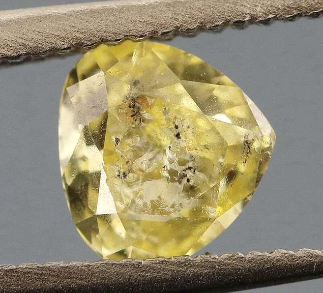 Amazing .28ct pear cut sultry yellow Diamond