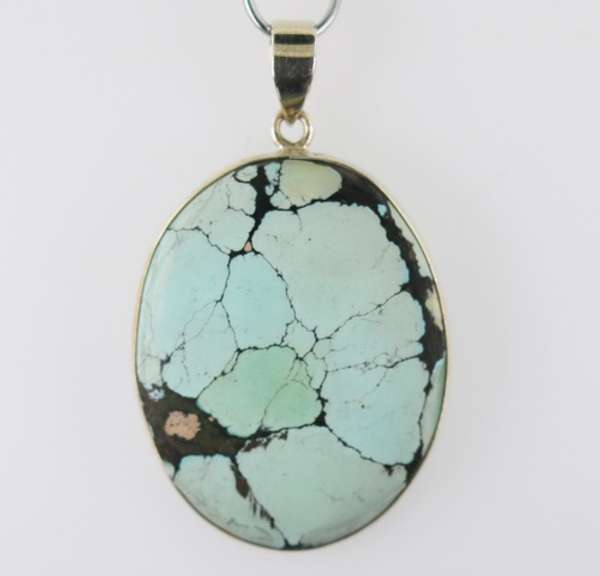 Striking well marbled 52.84ct Turquoise cabochon sterling pendant