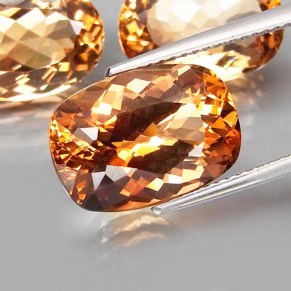 Matched! 3 piece 23.76ct full fire Imperial Topaz set