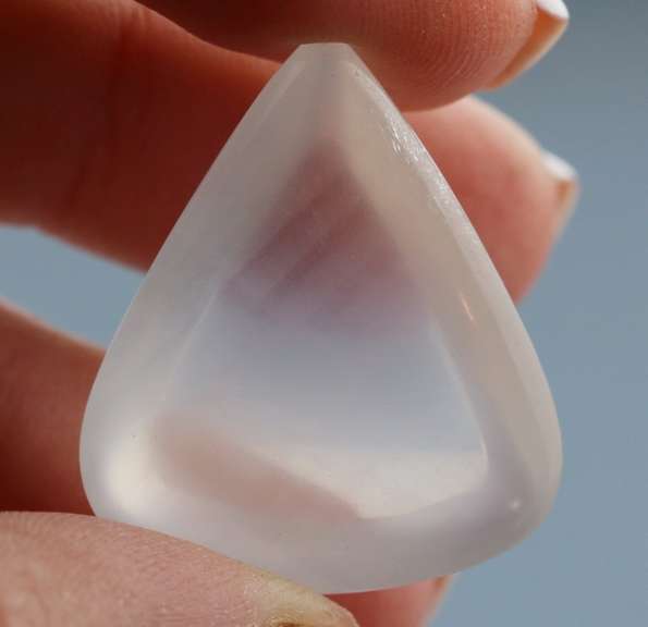 Beautiful 53.31ct highly polished Calcite pear cabochon