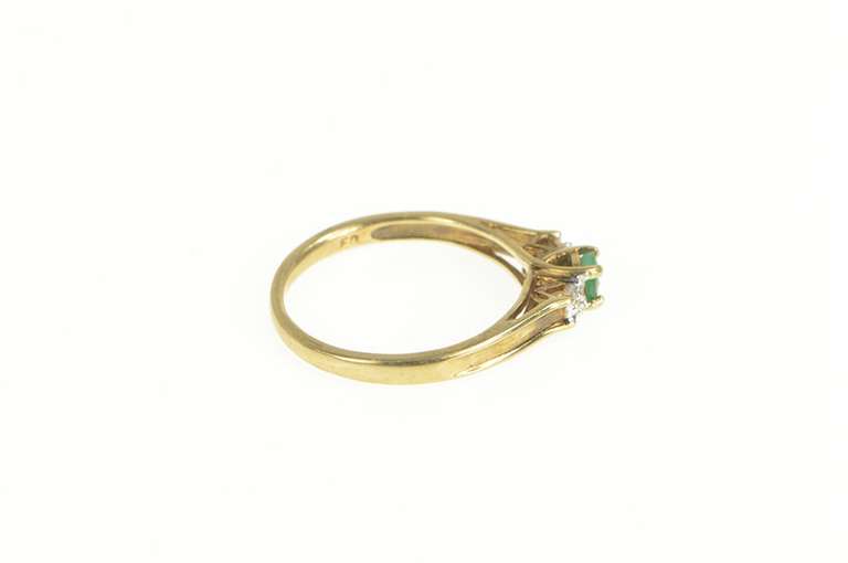 10K Yellow Gold Emerald Diamond Three Stone Engagement Ring