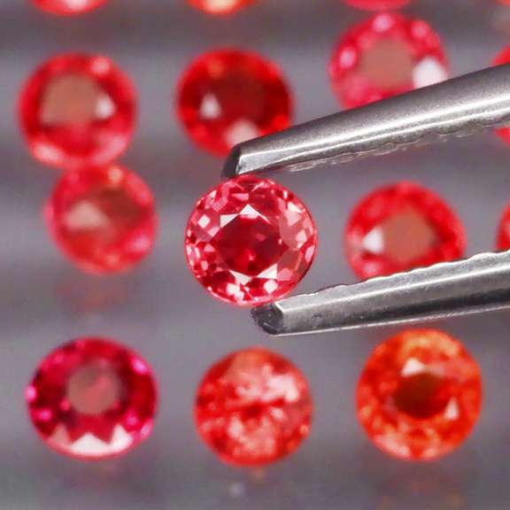 Round cut 3.39ct Imperial Red Sapphire set