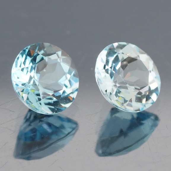 Matched 4.56ct pair of glittering sky blue Topaz