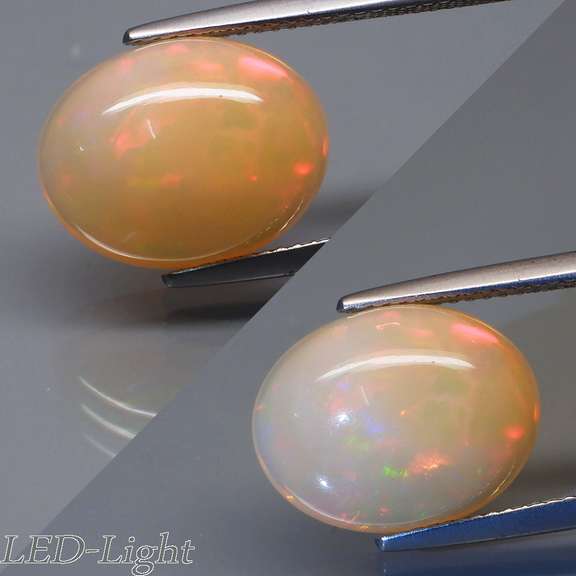 Magnificent 5.54ct flashing Semi Black Opal