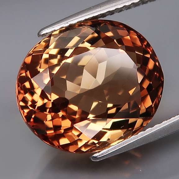 Lavish 12.08ct high fire Imperial Topaz