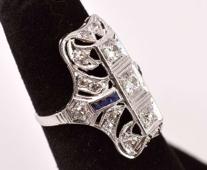 Fantastic Approx. 0.59CTW Diamond and 0.12CTW Sapphire Ring in Platinum
