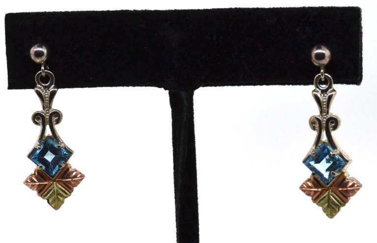 Silver Blue Topaz Earrings With Leaf Detailing