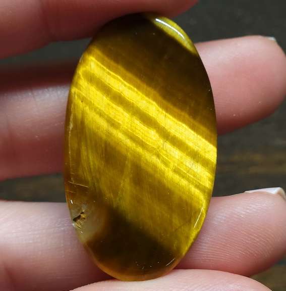 Mezmerizing 39.59ct Tigers Eye cabochon