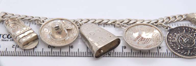 Vintage 925 Sterling Silver Mexico 7 Charms Cuban Link Bracelet