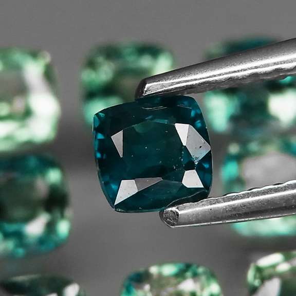 Vivid blue 3.92ct cushion cut Sapphire set