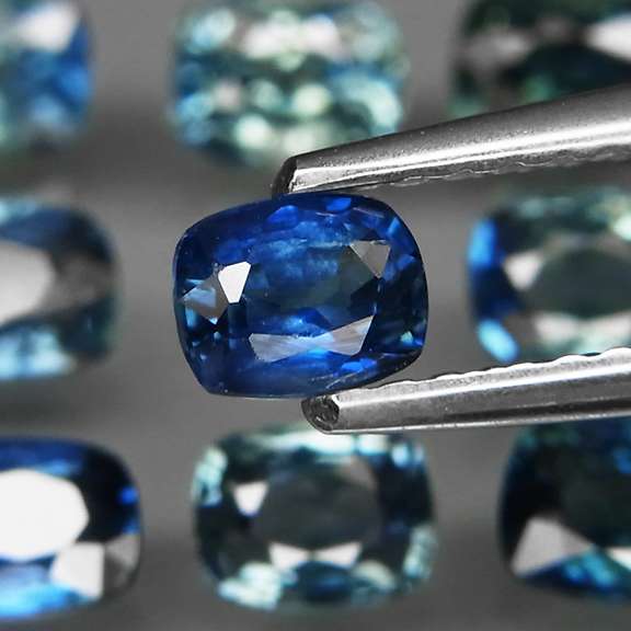 Rich blue 3.42ct cushion cut Sapphire set