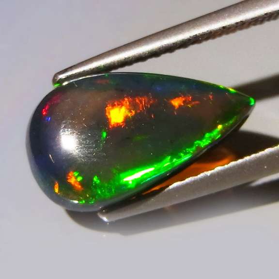 Glistening 2.17ct fiery flashing Welo Black Opal