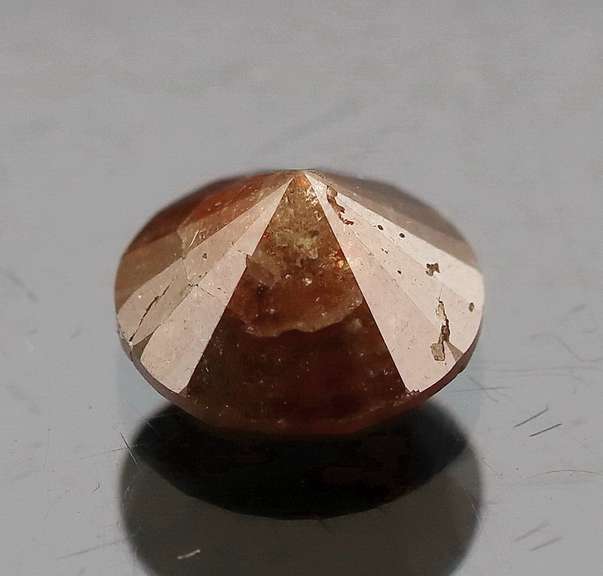 Eye catching 1.25ct round cut earth tones Diamond solitaire