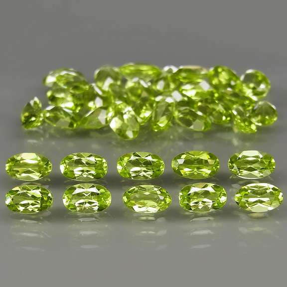 Dazzling 8.55ct untreated apple green Peridot set