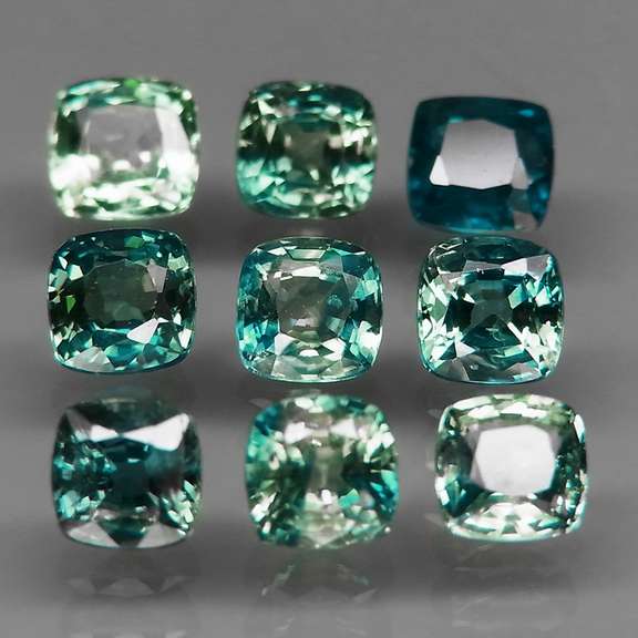 Vivid blue 3.92ct cushion cut Sapphire set