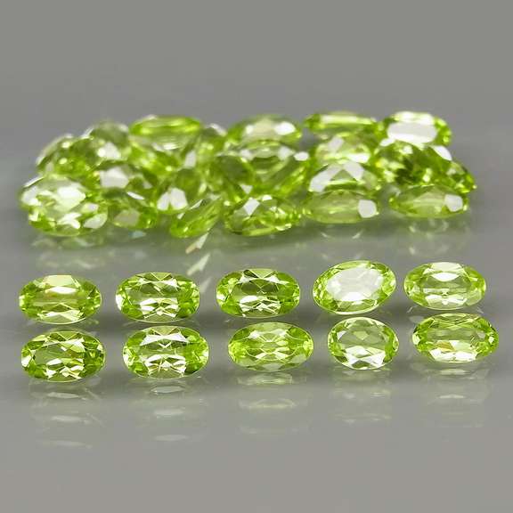 Real 8.55ct untreated apple green Peridot set