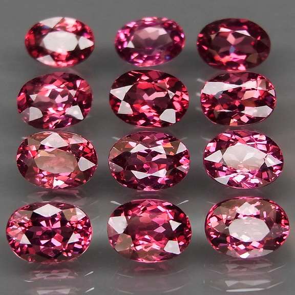 Ravishing 12.77ct violet pink Rhodolite Garnet set
