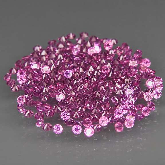 Diamond cut 3.01ct violet pink Rhodolite Garnet set