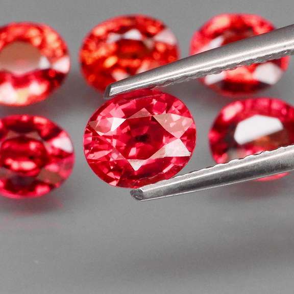 Brightly colored 4.42ct Imperial red Sapphire set