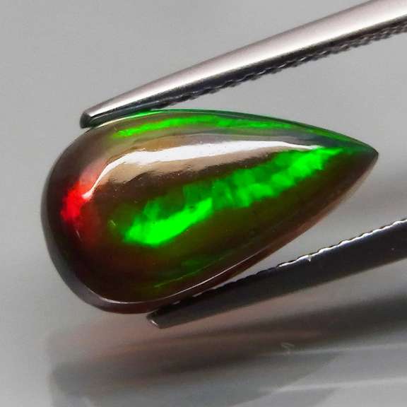 Glistening 2.17ct fiery flashing Welo Black Opal