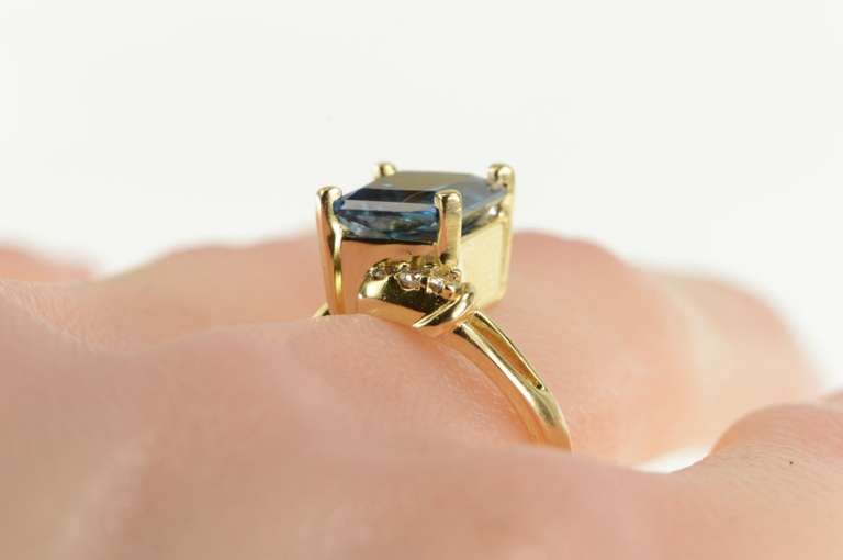 14K Yellow Gold Emerald Cut Blue Topaz Diamond Bypass Ring