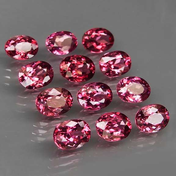Ravishing 13.53ct violet pink Rhodolite Garnet set