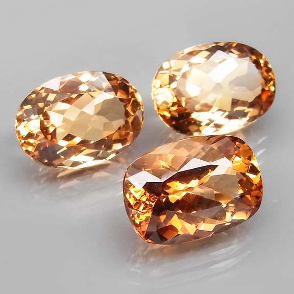 Matched! 3 piece 23.76ct full fire Imperial Topaz set