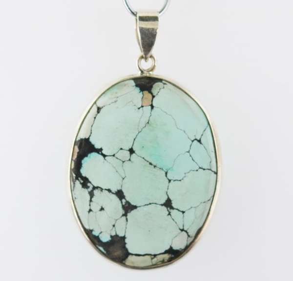 Striking well marbled 52.84ct Turquoise cabochon sterling pendant