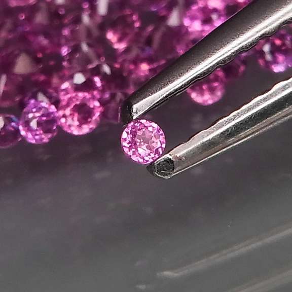 Diamond cut 3.01ct violet pink Rhodolite Garnet set