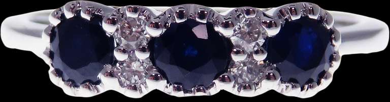 Gorgeous Sapphire Triple Set 18k White Gold Ring bordered with Diamonds