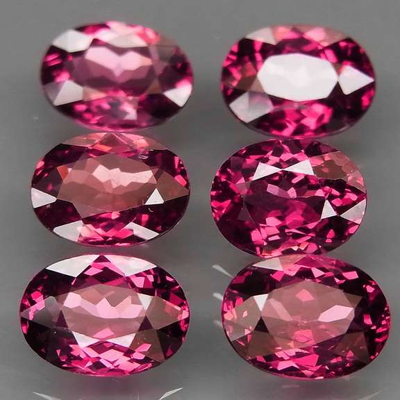 Amazing 9.90ct oval cut violet pink Rodolite Garnet set