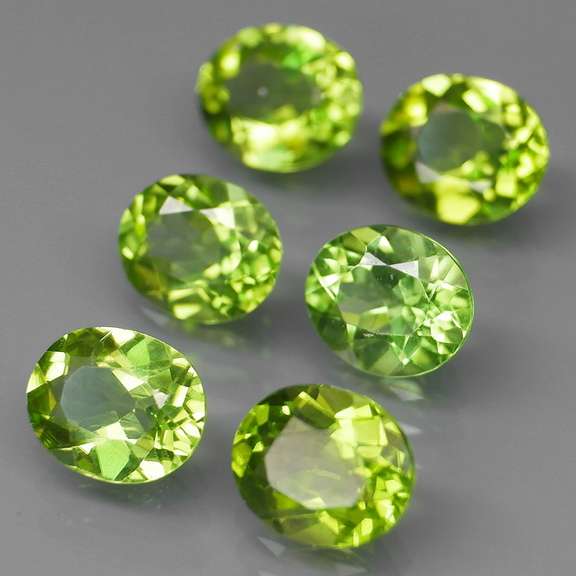 Ravishing 7.38ct untreated lime green Peridot set