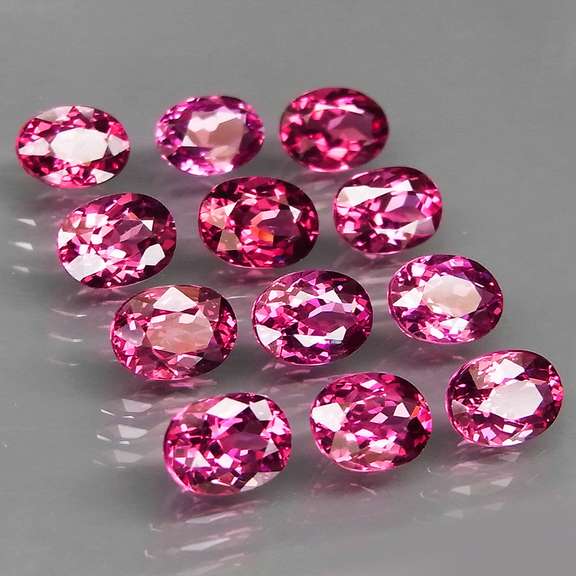 Remarkable 13.19ct violet pink Rhodolite Garnet set