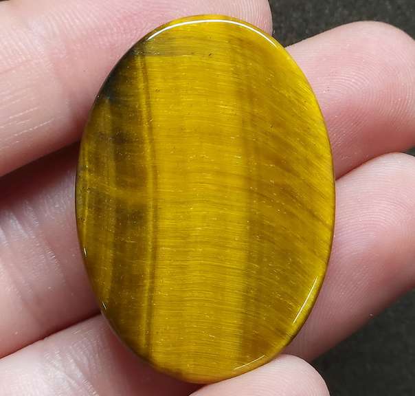 Look at that shimmer! 43.67ct Golden Tiger Eye cabochon