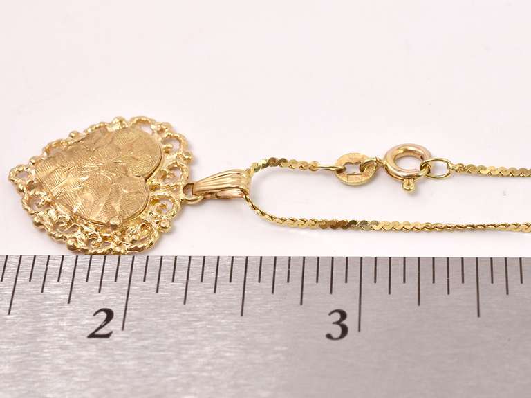 Captivating Heart Locket Pendant Necklace in 14K Yellow Gold