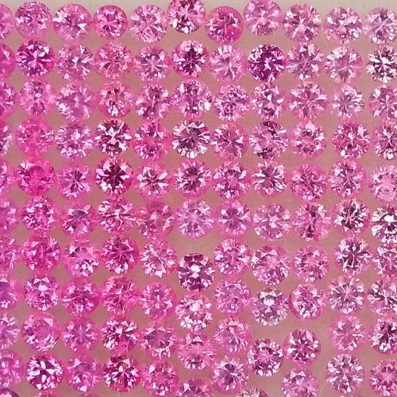 Gorgeous color! Heated only 4.83ct pink fade Sapphire set