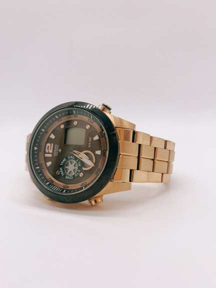 Citizen Eco-Drive Gold Tone Black Bezel Watch