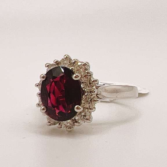 Stunning 14kt Gold, Pink Tourmaline, & Diamond Halo Ring