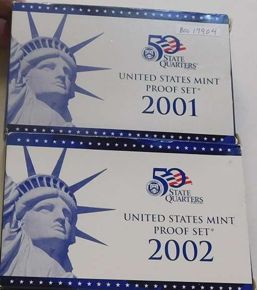 2 sets:  2001 & 2002 PRF Sets   NOTE: The US Mint is now charging $32 for current non-Silver PROOF Sets.