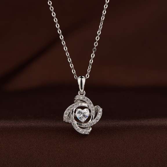 Dancing Heart Stone Silver Pendant