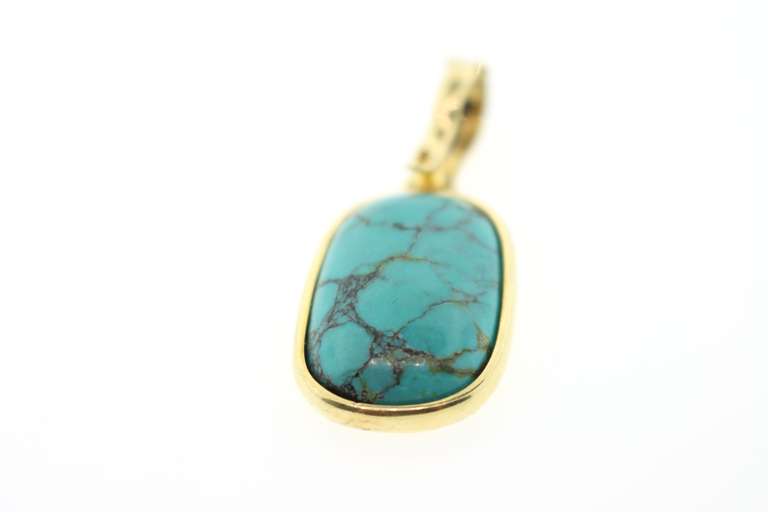 Stylish 18kt Yellow Gold Turquoise Elongated Oval Pendant
