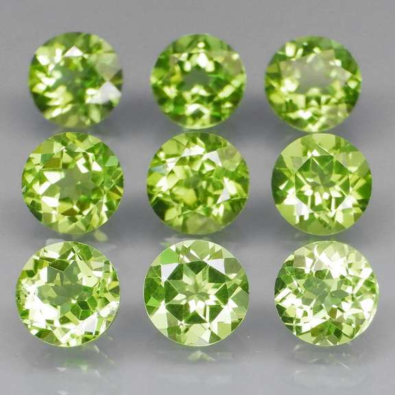 High grade 8.25ct untreated apple green Peridot set