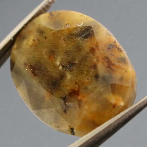 Super unique calico 13.44ct faceted Sapphire