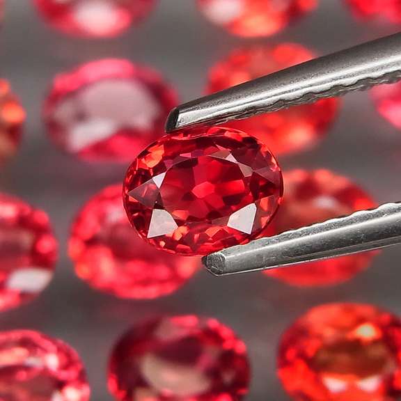 Brilliant 5.40ct fancy orange Songean Sapphire set