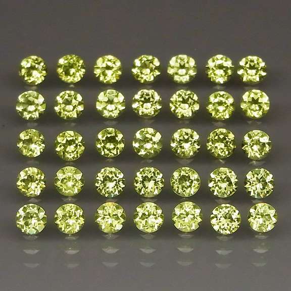 Dazzling 4.32ct untreated apple green Peridot set